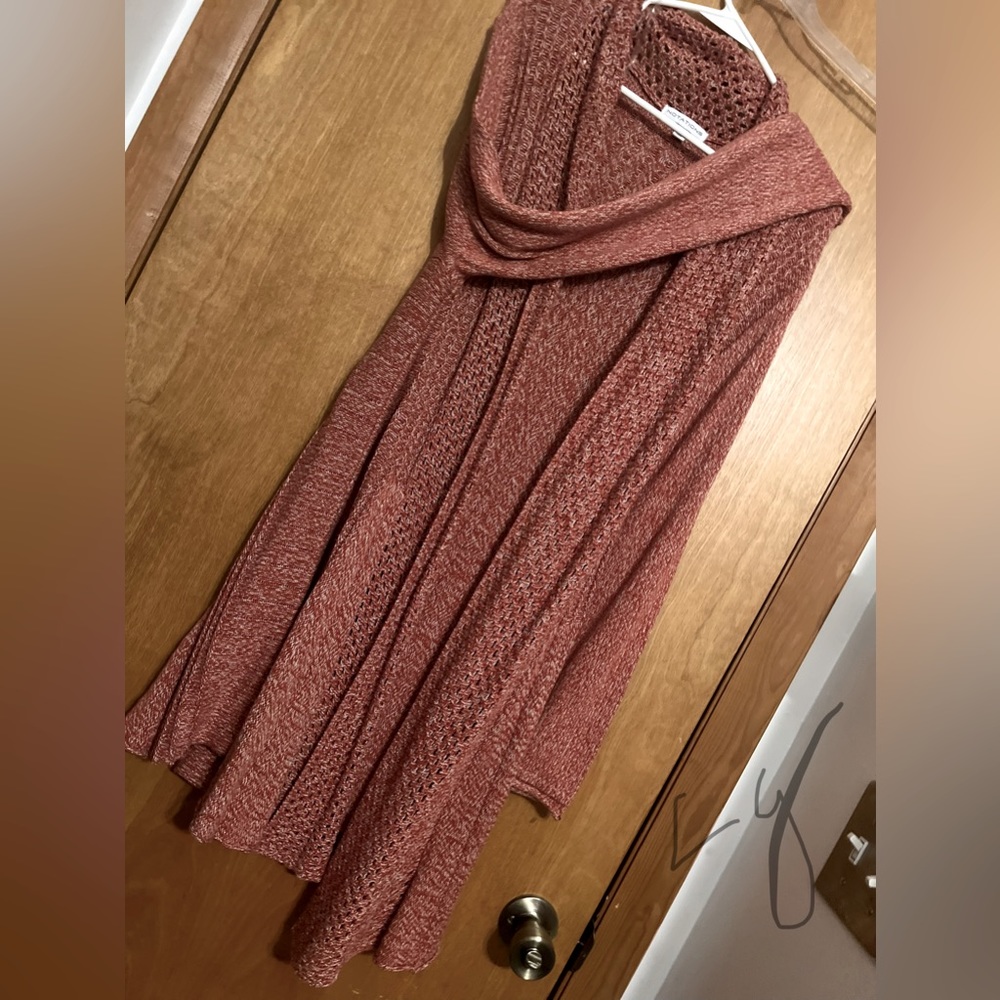 Fairly new light red long sweater.